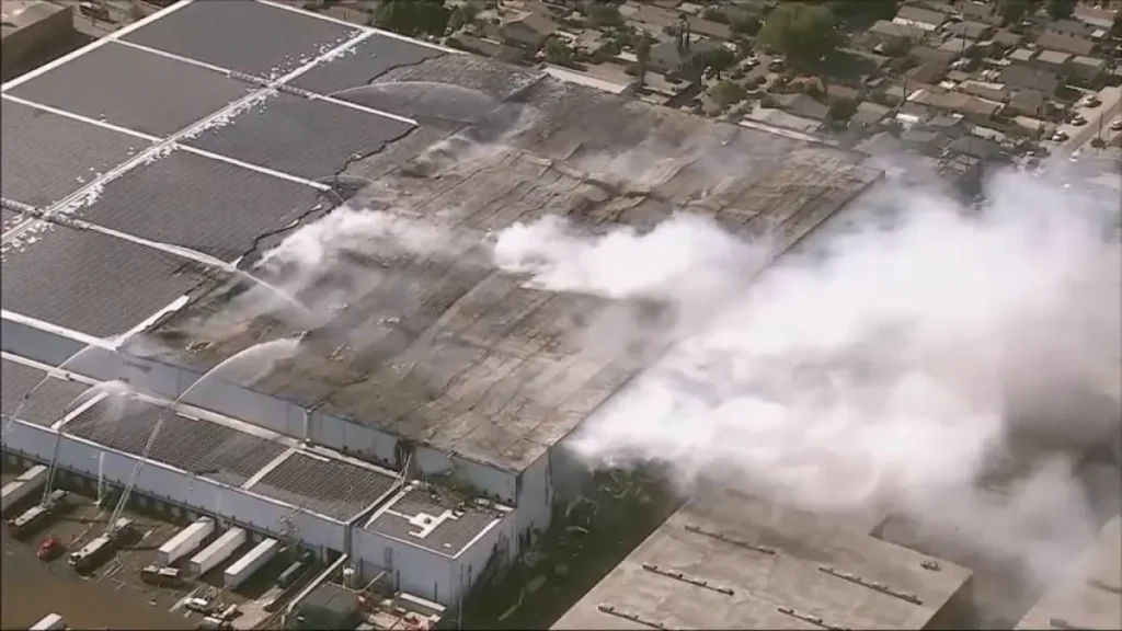 overhead shot of smoke billowing from the Lineage warehouse fire.